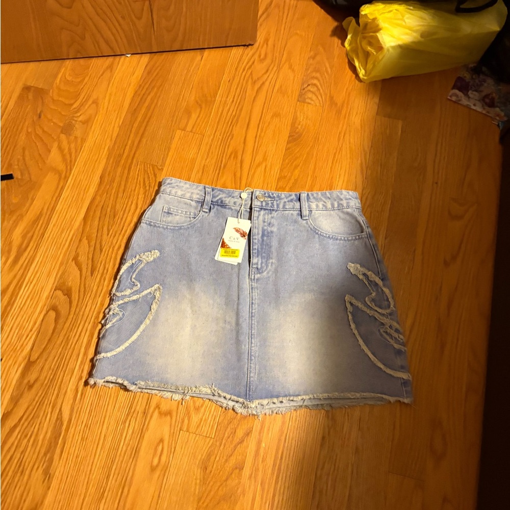 Chelsea & Violet Light Blue Distressed Mini Skirt